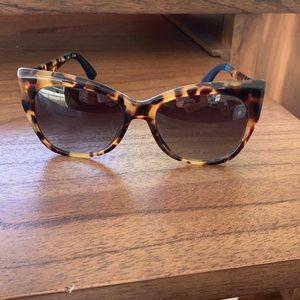 Tortoise shell sunglasses by Toms